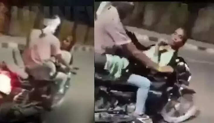 பைக்கில் காதல் ஜோடி