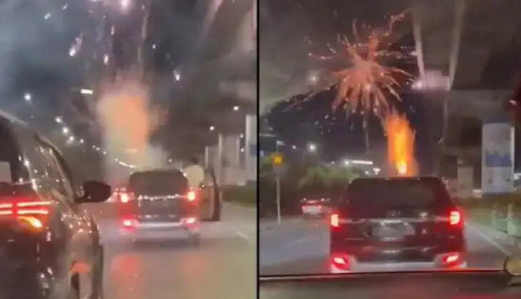 காரின் மேற்கூரையில் வெடித்த பட்டாசு