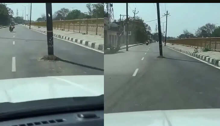 ரோட்டில் மின் கம்பம்