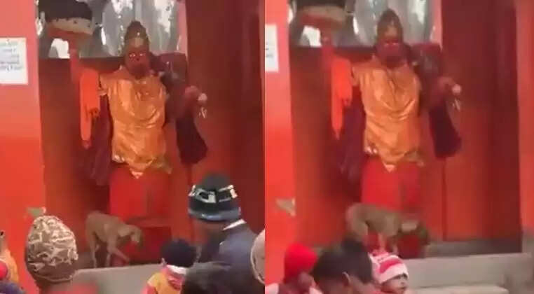 அனுமன் சிலையை வழிபட்ட நாய்