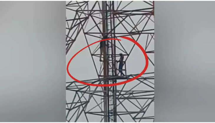 செல்போன் டவரில் ஏறி தற்கொலை மிரட்டல்