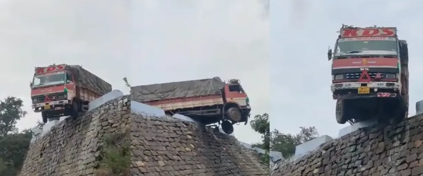 அச்சச்சோ... கொண்டை ஊசி வளைவில் அந்தரத்தில் தொங்கிய லாரி..!!