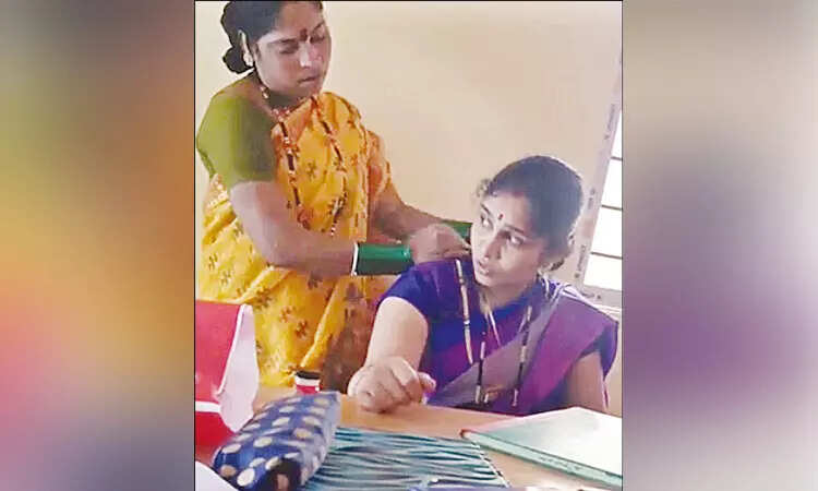 உதவியாளரை மிரட்டி மசாஜ் செய்ய சொன்ன தலைமை ஆசிரியை!
