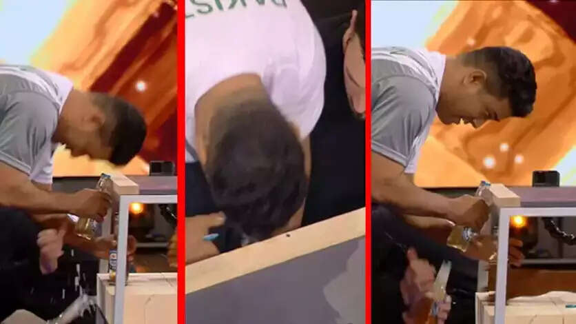 வைரல் வீடியோ... ஒரே நிமிடத்தில் 77பாட்டில் மூடிகளை தலையால் திறந்து கின்னஸ் சாதனை!