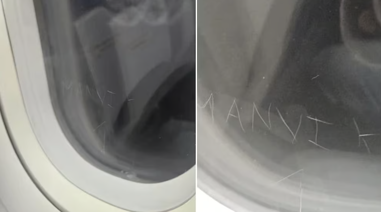 விமான ஜன்னலில் தனது பெயரை கீறிவைத்த பயணி... !