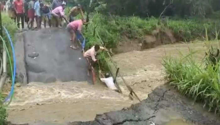 வீடியோ!! காட்டாற்று வெள்ளத்தில் சிக்கியவரை உயிருடன் மீட்கும் பரபரப்பு நிமிடங்கள்!!