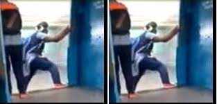 பகீர் வீடியோ!! ஓடும் ரயிலில் கீழே காலை தேய்த்துக் கொண்டே செல்லும் பள்ளி மாணவி!!