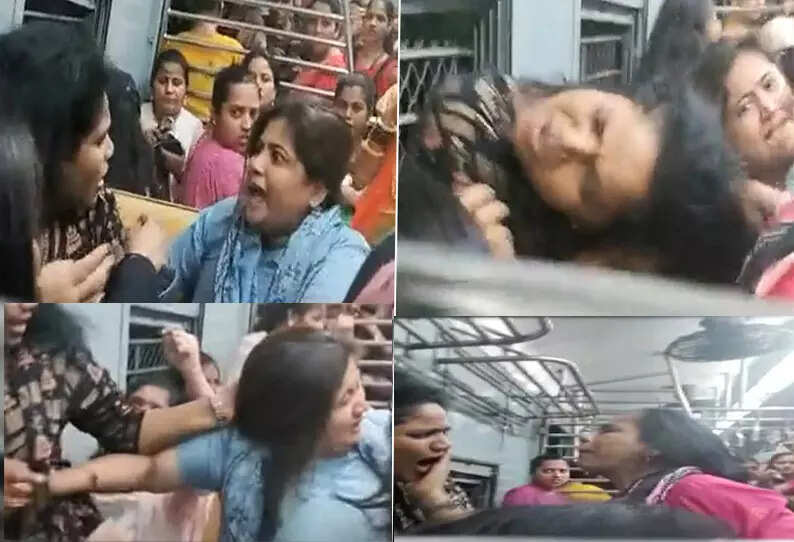 வைரல் வீடியோ!! ஓடும் ரயிலில் பெண்களுக்கு இடையே குடுமிப்பிடி சண்டை!!