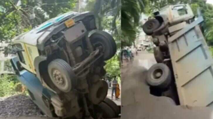 நடுரோட்டில் குழிக்குள் விழுந்த லாரி... சாலையின் பள்ளத்தை நிரப்ப வந்தது போது விபரீதம் - வைரலாகும் வீடியோ!